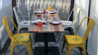 The downtown hot spot added a Greenhouse Village with eight outdoor pods.