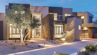 Six-bedroom house is located in The Ridges, an exclusive, guard-gated community.