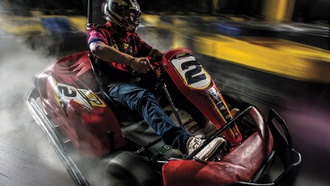 The indoor facility has electric vehicles that can achieve 45 mph.