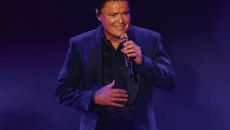 Performance is packed with dancing, singing and ... rapping.