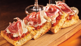 The Resorts World restaurant combines cocktails and wine with an expansive menu.