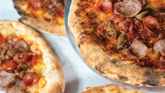 Buddy Valastro's new Harrah's eatery offers different pizzas and his famed desserts.