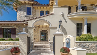 The lakeside home is inspired by the villas of Italy.