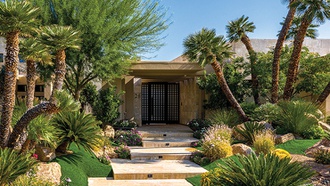 The 9,873-square-foot estate fronts a world-class golf course.