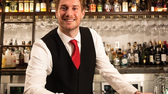 Lead bartender at Delmonico Steakhouse provides great cocktails and conversation.