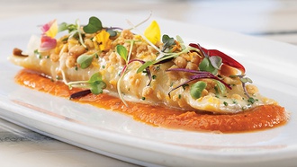 The STRAT restaurant's summer menu includes lobster, crab and Icelandic salmon.