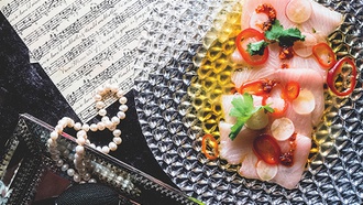 The jam-packed evening at Bellagio is entertaining both on the table and on the stage.