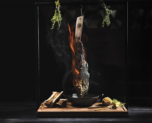 The flaming tomahawk at Toca Madera, a Mexican steakhouse at The Shops at Crystals in Las Vegas