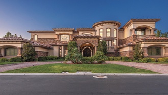 Residence provides luxury living in a guard-gated community.