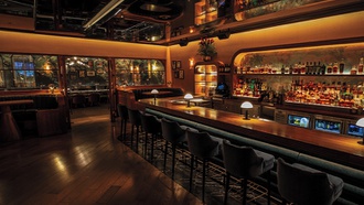 Signature cocktails and vintage décor equals a good time at this Flamingo lounge.