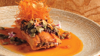 Chinese and Mexican cuisines share the spotlight at this energetic Cosmopolitan eatery.