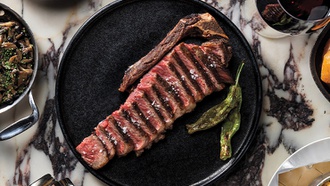 Both cocktails and food create a singular meal at Resorts World for steakhouse fans.