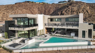 Palatial, custom-built houses are nestled into the hills of the Las Vegas Valley.