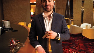 Cigar and cocktails are paired at several different venues to create different experiences.