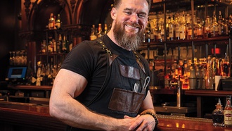 This corporate mixologist adds his style to The Barbershop Cuts & Cocktails menu.