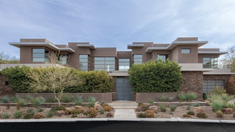 The exterior and interior are seamlessly blended together at this Ridges residence.