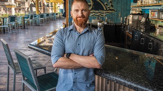 Margaritaville's bar manager has found his happy place.