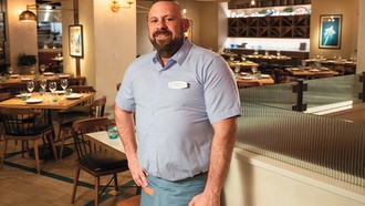 Osteria Costa server has called the resort home since the day it opened.