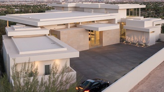 This two-story palatial estate is located within a 555-acre, private residential lifestyle club community.