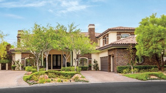 This home in The Lakes has plenty of rooms for the largest of families.