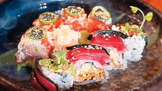 Aces forward Alysha Clark and chef Thanawat Bates have introduced the Double 07 roll at ...