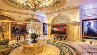 The famous photographer displays his work inside one of the city’s most luxurious penthouse suites.