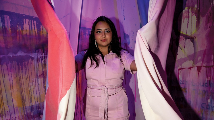 UNLV's MFA candidate Karla Lagunas is painting her evolving installation 'Meta-Telos III' at Omega Mart in Las Vegas
