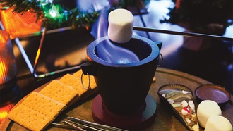 Holiday-themed bites and bright cocktails highlight this fun, seasonal experience.