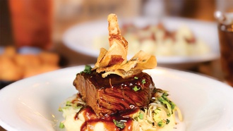 Some of the star's favorite dishes make the cut in the new restaurant.