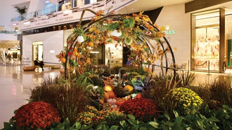 The retail center's seasonal exhibits showcase classic scenes of autumn beauty.