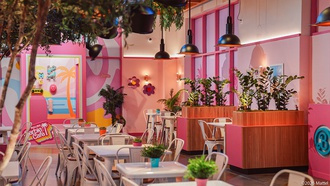The toy icon gets her own restaurant at AREA15—complete with roller rink.
