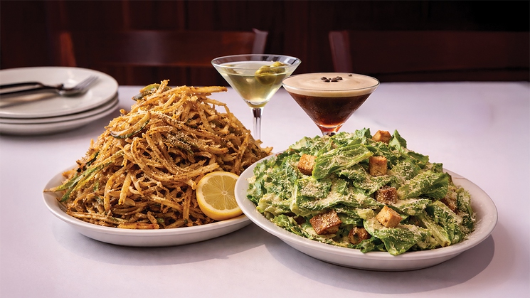 Caesar salad and shoestring-style fried zucchini, part of the Original Girl Dinner menu at Carmine's Las Vegas at The Forum Shops at Caesars Palace