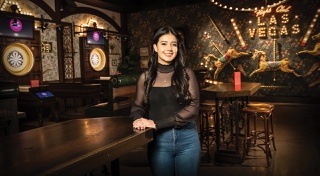 The Flight Club ambassador welcomes everyone to a unique darts experience.