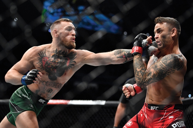 Conor McGregor, left, competes in UFC 329 at T-Mobile Arena as part of International Fight Week in Las Vegas